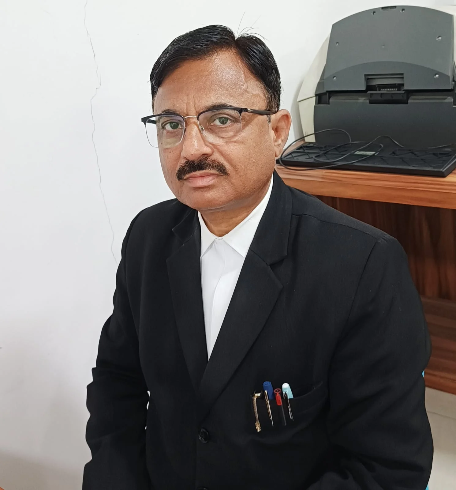 Adv.Ravindra Pande
